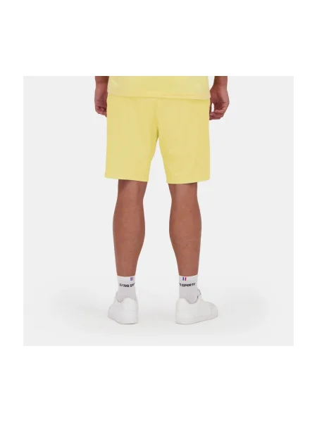Pantaloni Le Coq Sportif galben