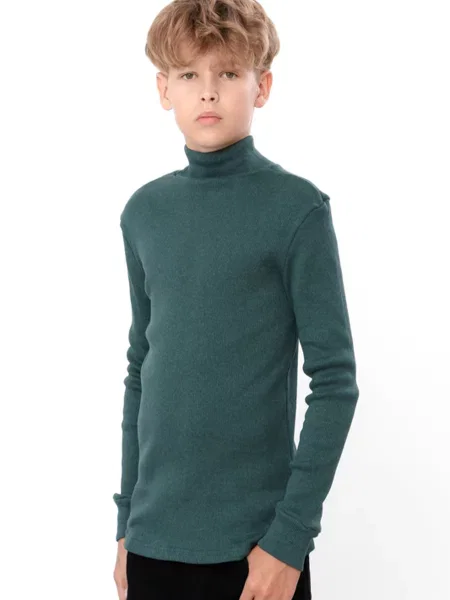 Гольф свитер носи своє зеленый