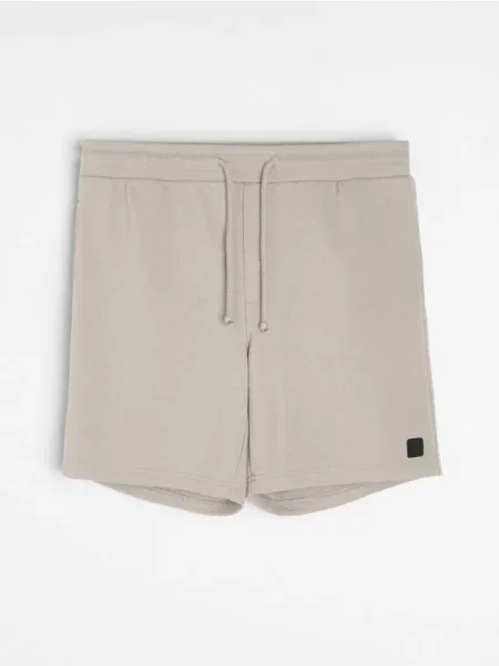 Sinsay Teplákové šortky s tkaničkou béžová