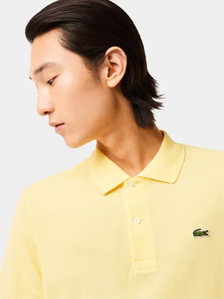 Поло Lacoste желтое