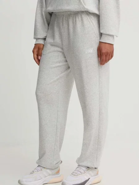 Donji dio trenirke New Balance French Terry Crew melanž siva