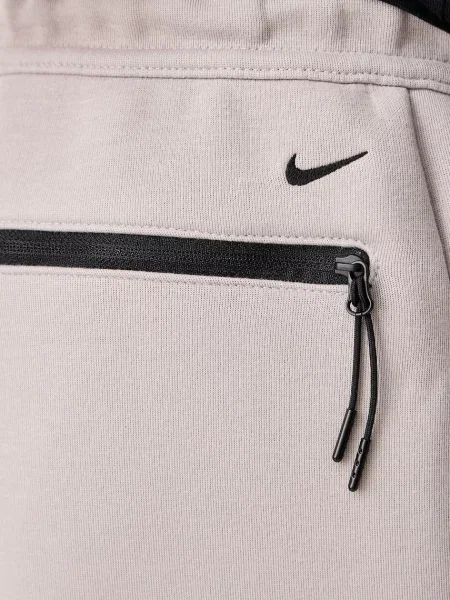 Sportnadrág Nike Sportswear bézs