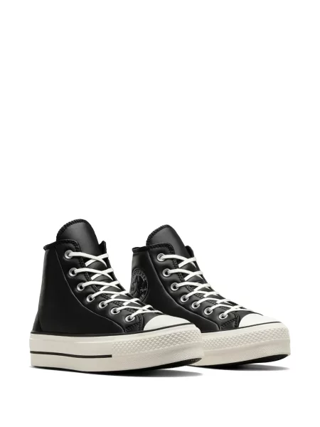 Iš natūralios odos sportbačiai Converse Chuck 70 izoliuoti ant pleištinio kulniuko pilka