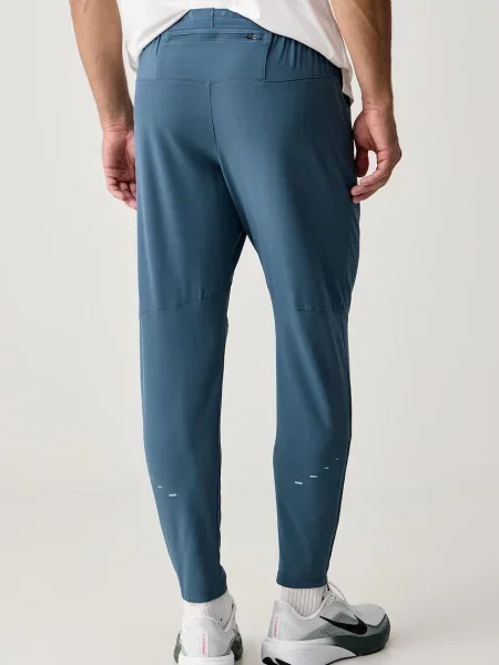 Nike spodnie dresowe Stride Dri-FIT niebieskie