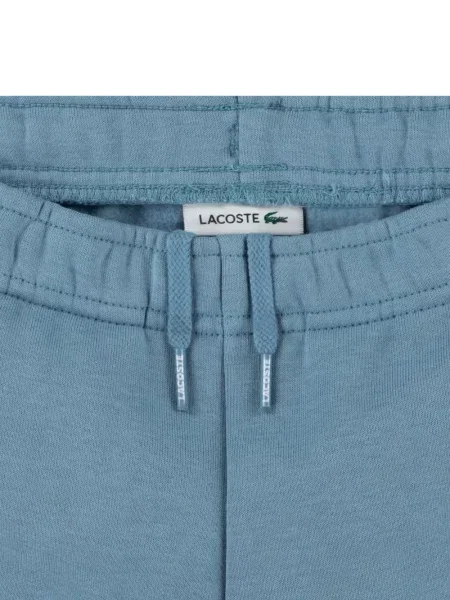 Dětské kalhoty Lacoste modré
