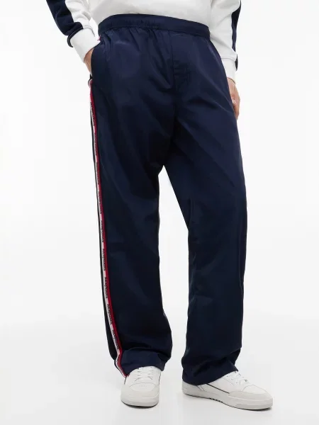Tommy Jeans Nohavice JAIMIE námornícka modrá / červená biela