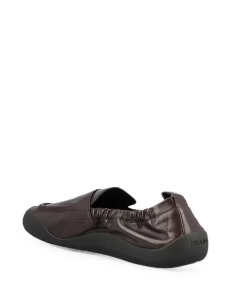 Sneakerși Prada din piele maro