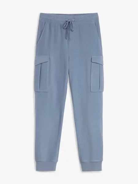 Ciepłe spodnie cargo z polarowego materiału regular fit niebieskie