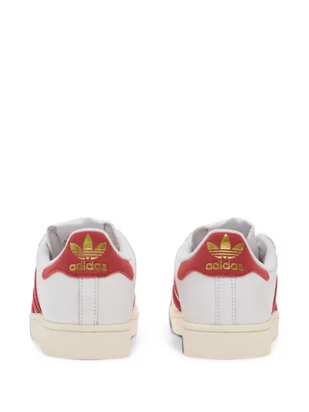 Decupat pantaloni scurți Adidas cu dungi cu autograf albastru