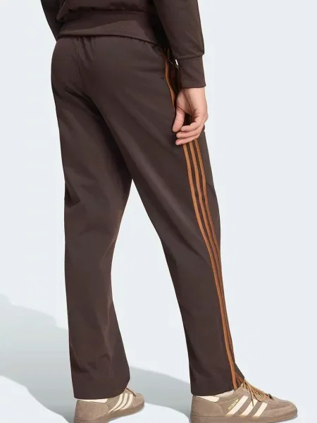 Adidas Originals teplákové nohavice pánske Firebird hnedá