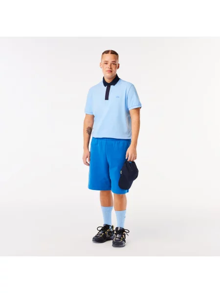 Поло Lacoste голубое