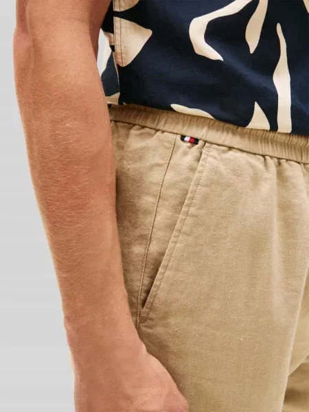 Tommy Hilfiger Chinosy Harlem beżowy