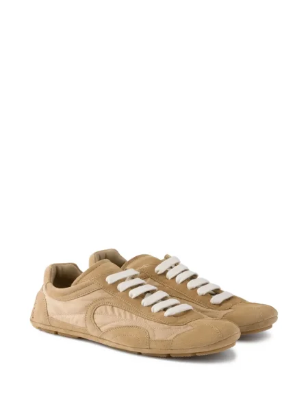 Sneakerși Prada din dantelă
