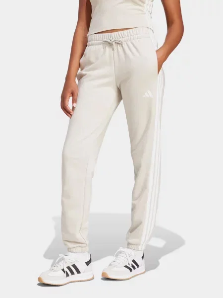 Спортивні штани adidas ESSENTIALS FRENCH TE бавовна/поліамід бежевий