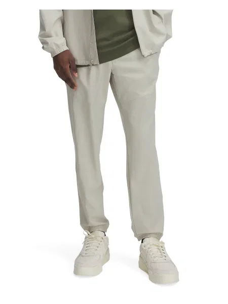 UNDER ARMOUR Sportovní kalhoty Vibe pastelově zelená