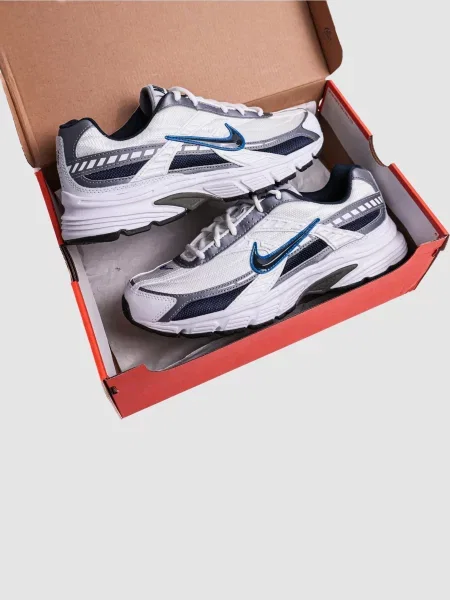 Кожаные кроссовки Nike белые