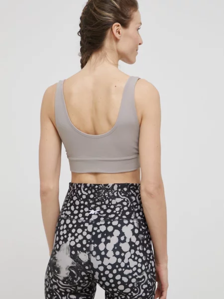 Sportovní podprsenka Reebok šedá hladký