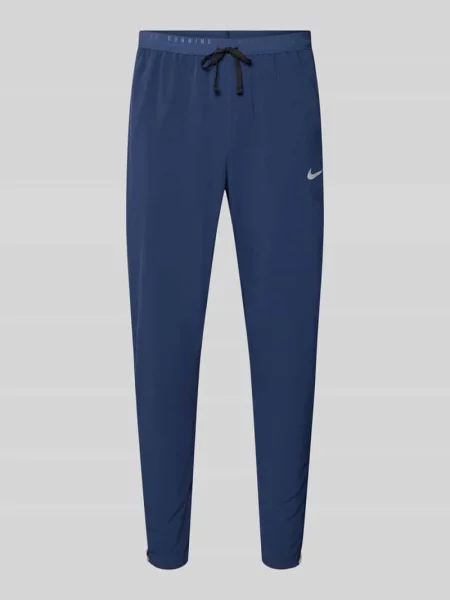 Spodnie treningowe o kroju slim fit z technologia dri-fit model Stride' Nike Training granatowe