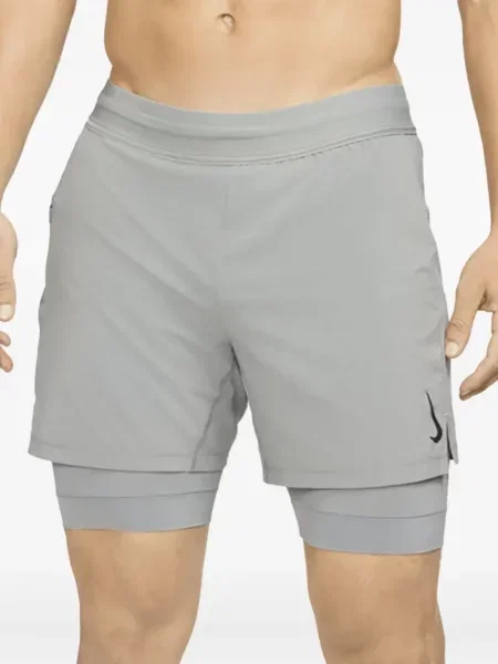 Krátké fleecové kraťasy Nike s potiskem žluté