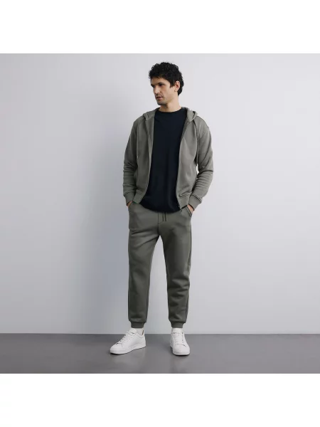 Reserved Teplákové kalhoty regular fit pudrově zelená