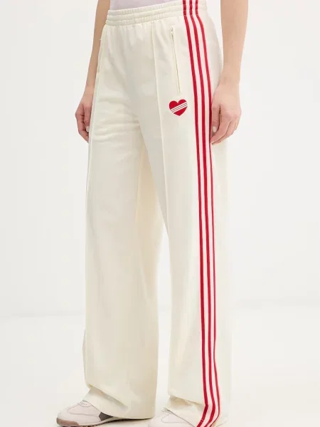 Adidas Originals spodnie dresowe beżowe