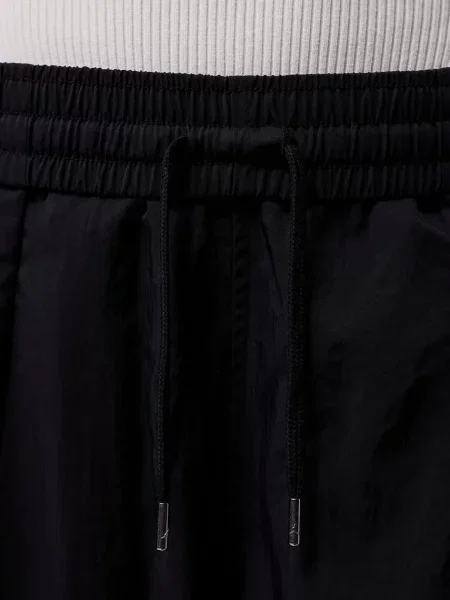 Nadrágok Jordan Brooklyn Woven Pants Black XS fekete