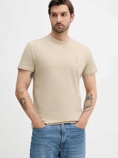 Тениска Tommy Jeans с изчистен дизайн жълто