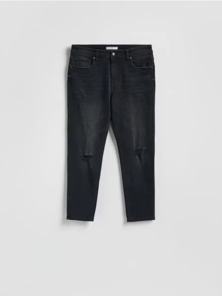 Reserved Blugi carrot slim cu aspect deteriorat negru