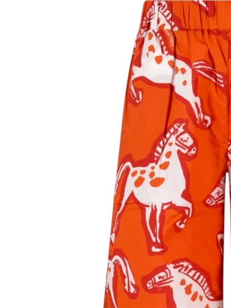 Dětské kalhoty Stella Mccartney oranžové