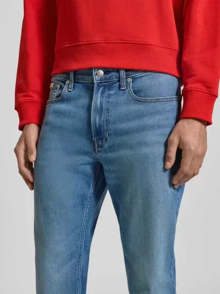Jeansy w kroju slim fit z naszywką z logo model Clearwater' Calvin Klein Jeans niebieskie