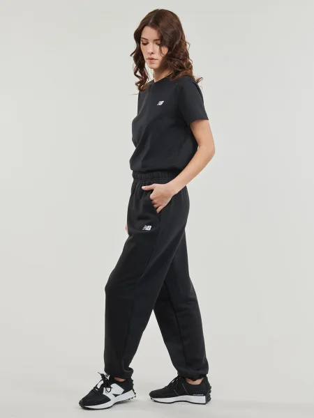 Froté teplákové nohavice New Balance čierna
