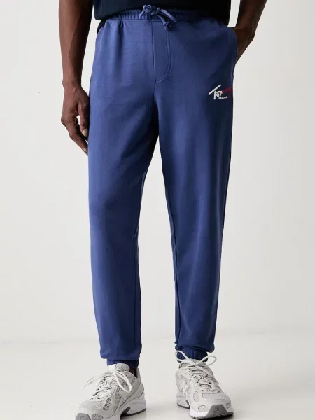 Tommy Jeans pantaloni de trening pentru bărbați din albastru