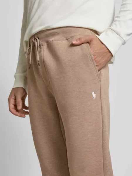 Spodnie dresowe o kroju regular fit z dodatkiem bawełny Polo Ralph Lauren beżowy