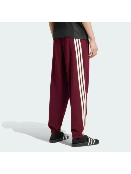 Joggery Adidas w paski białe