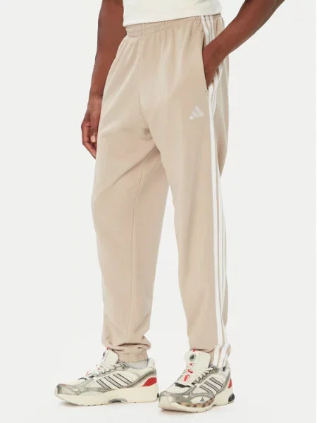 Adidas Spodnie dresowe Essentials French Terry Tapered Cuffed beżowy