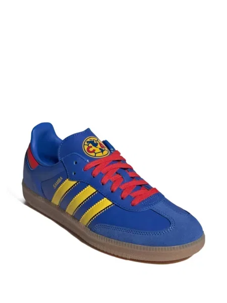 Pantaloni evazați Adidas evazat din jerseu cu cordon albastru
