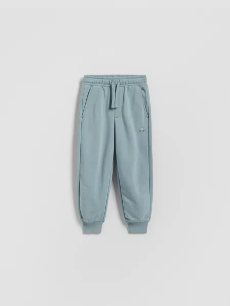 Reserved jogger kalhoty světle modrá