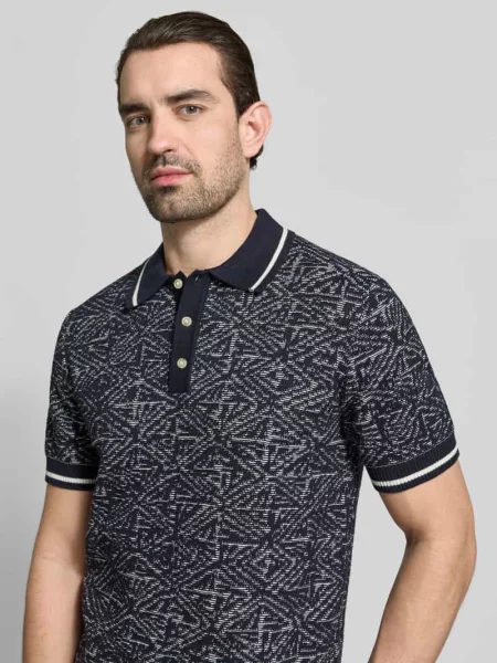 Koszulka polo o kroju regular fit we wzór na całej powierzchni Jack & Jones Premium granatowe