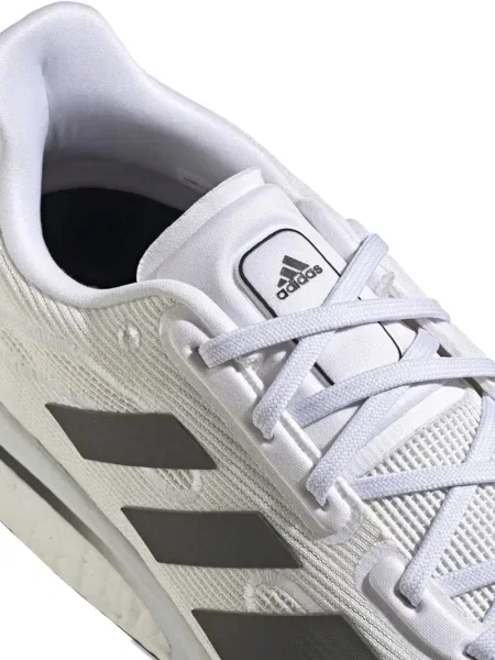 Sneakerși Adidas Solar cu șireturi cu dungi din dantelă negru