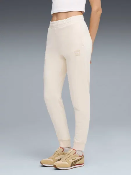 Штани спортивні PUMA Ess Elevated Sweatpants молочний комбінований верх