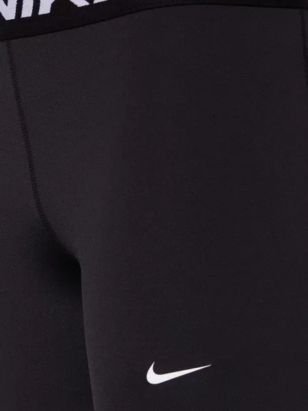 Nike Legginsy schwarz białe
