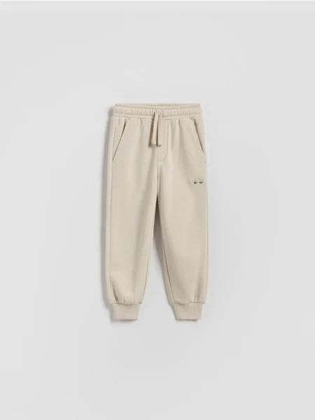 Reserved Pantaloni jogger din bej