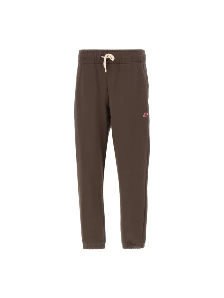 Spodnie New Balance brązowe