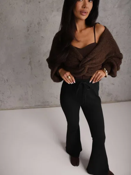 Pantaloni flare modelatori din tricot din Tirena negri
