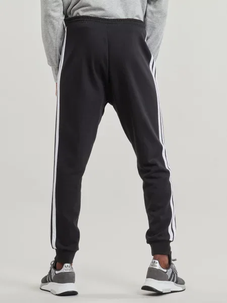 Fleecové pruhované kalhoty jogger Adidas černé