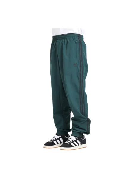 Adidas Spodnie dresowe adicolor Woven Firebird zielony