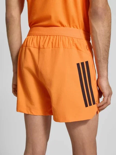 Szorty w kroju regular fit z nadrukiem logo model Power' Adidas Training pomarańczowe