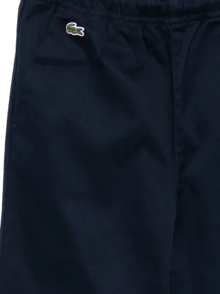 Dětské kalhoty Lacoste modré
