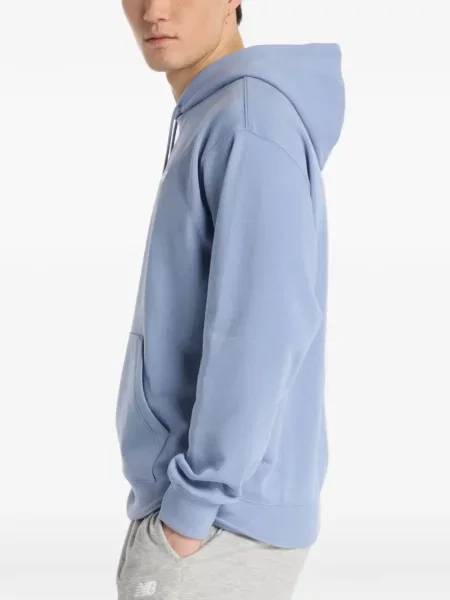 Majica s kapuljačom New Balance s kapuljačom plava