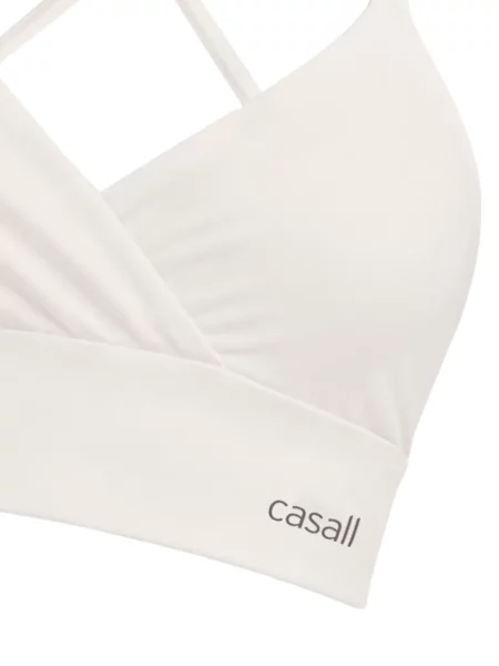 Спортен сутиен Casall с V-образно деколте бяло
